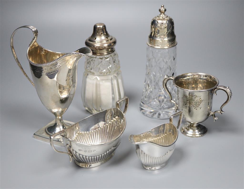 A Georgian silver helmet-shaped cream jug and five other items,